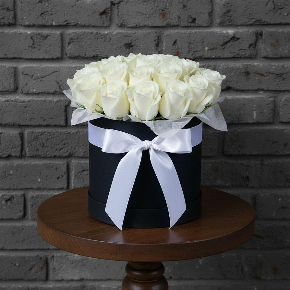 Цветочная композиция из Розы в шляпной коробке в Октябрьский Иркутской области